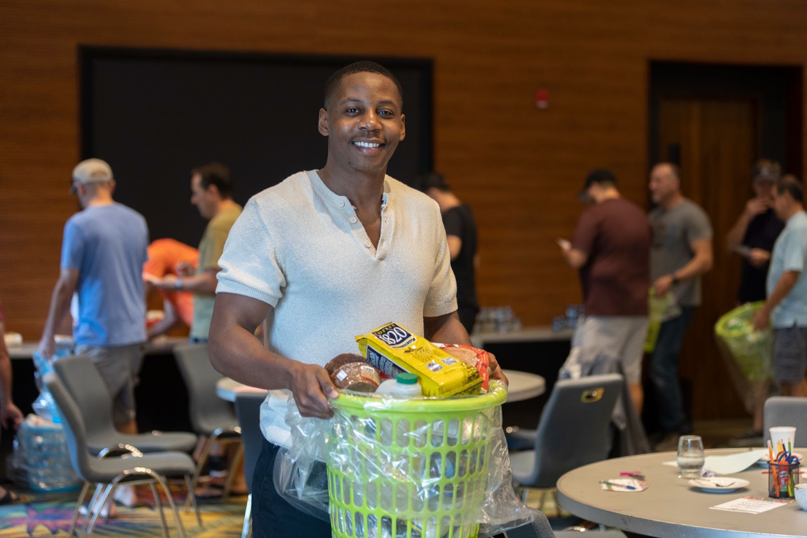 Charity Packing Event Man Smiling